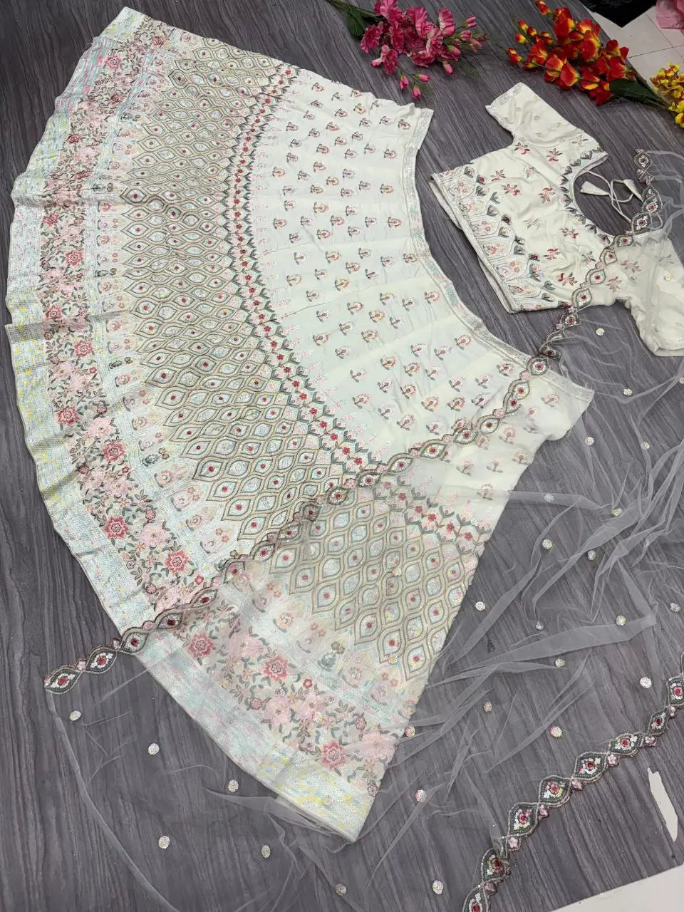 White Georgette Lehenga With Multi Color Thread Embroidery Dori And Sequins Work