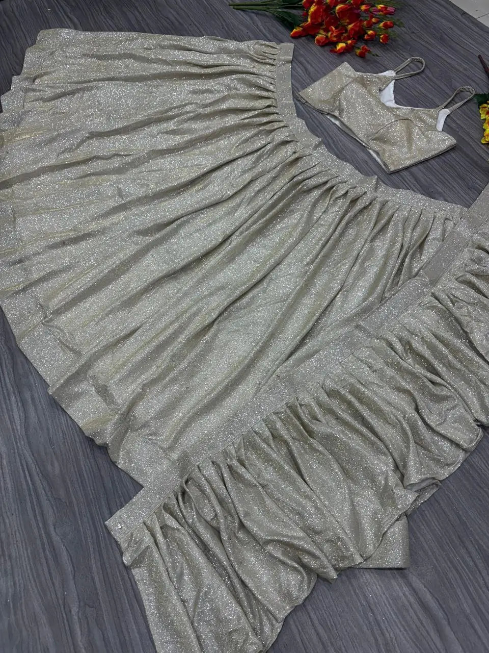 Gold And Silver Shining China Silk Lehenga With Fancy Ruffle Layer Dupatta