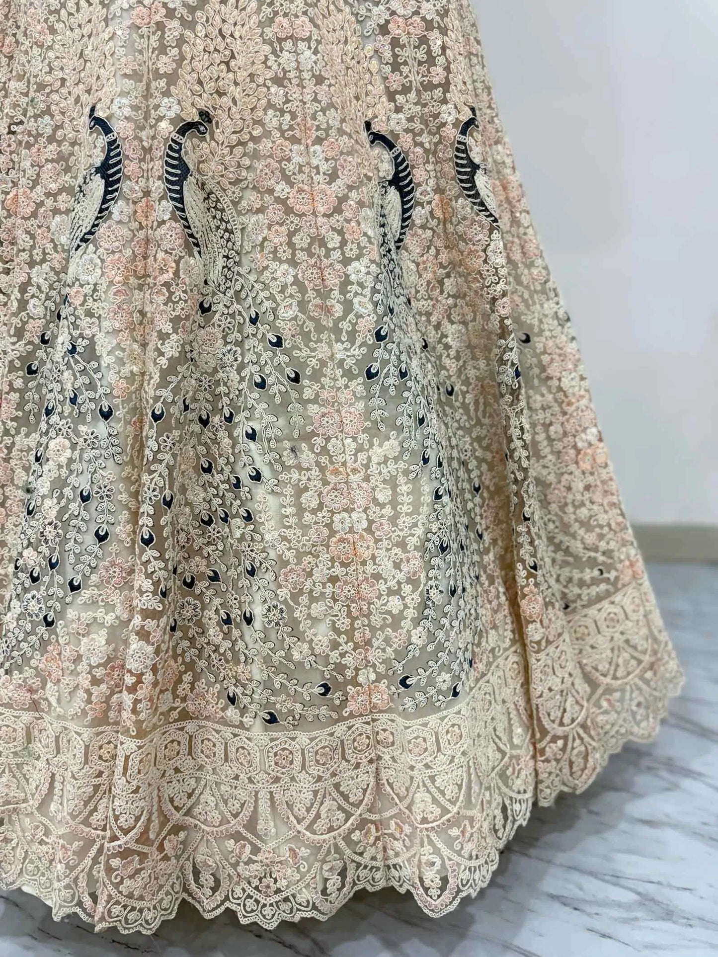 Light Peach Soft Net Lehenga With Multi Thread Sandwich Sequins Embroidery Work