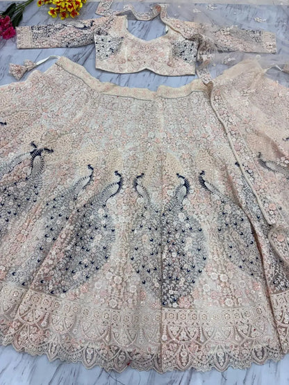 Light Peach Soft Net Lehenga With Multi Thread Sandwich Sequins Embroidery Work