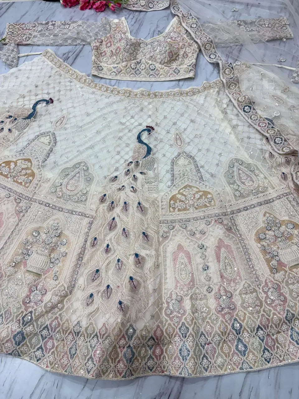 White Peacock Design Net Lehenga With Thread Coding Sequins Embroidery Work