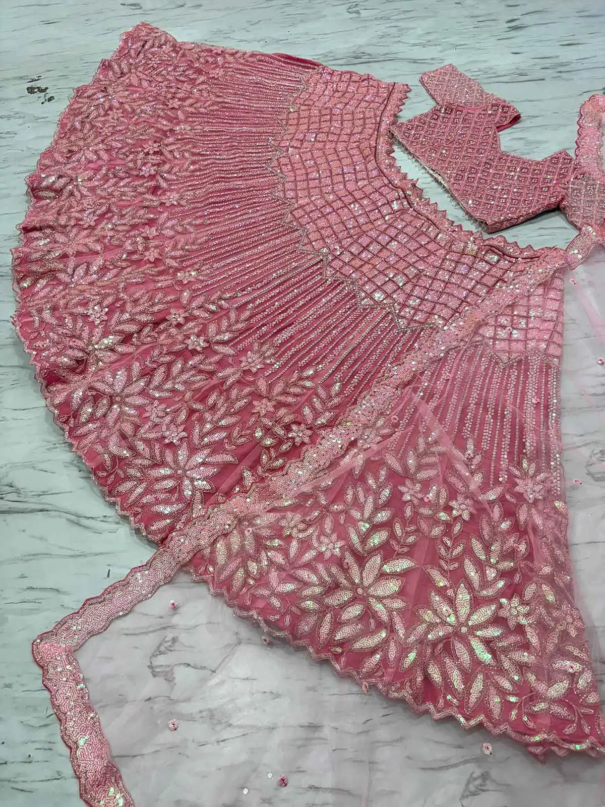 Peach Pink Rainbow Sequins Dori Embroidery Work Net Lehenga Choli