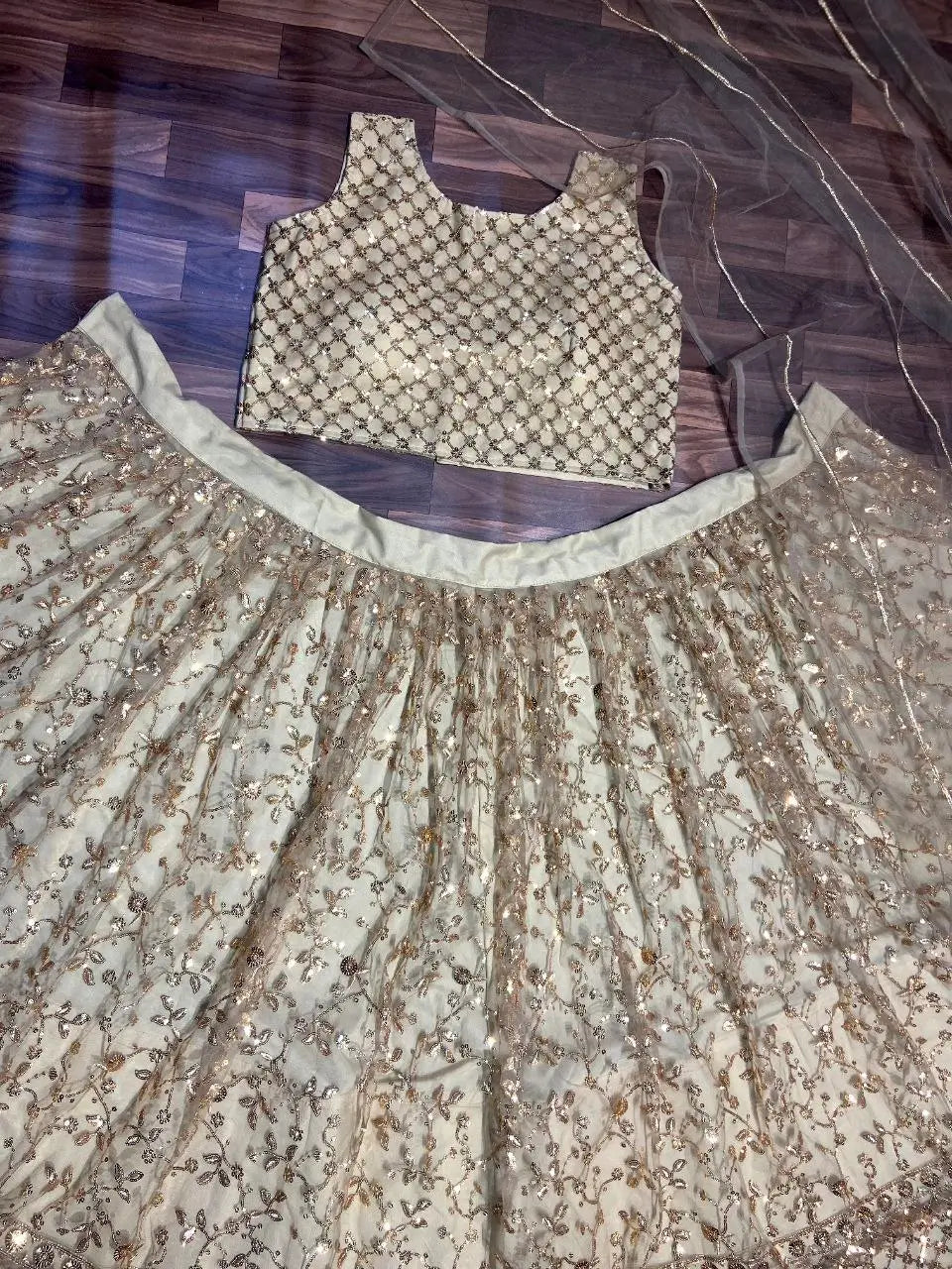 Light Brown Net Lehenga With Heavy Sequins Embroidery Work