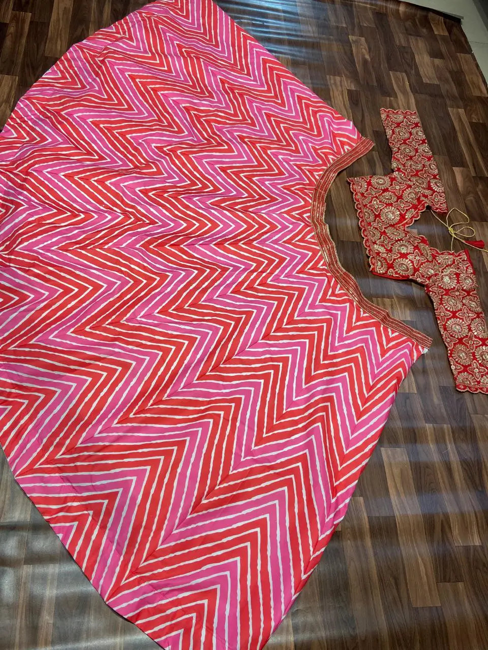 Multi Color Laheriya Print Lehenga With Coding & foil Work And Red Dupatta