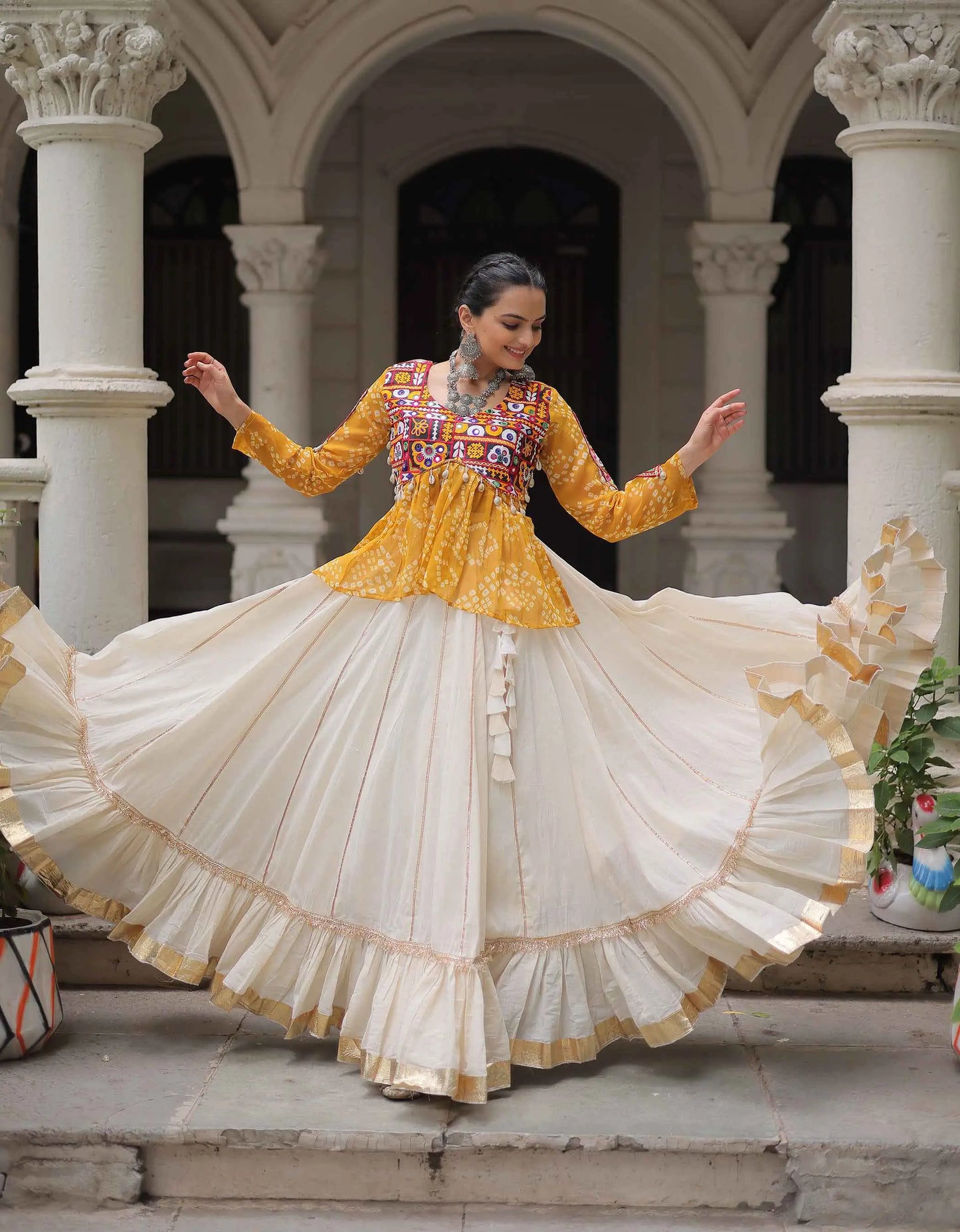 Yellow Bandhani Print Gamthi Work Blouse With Lace Work Navratri Lehenga