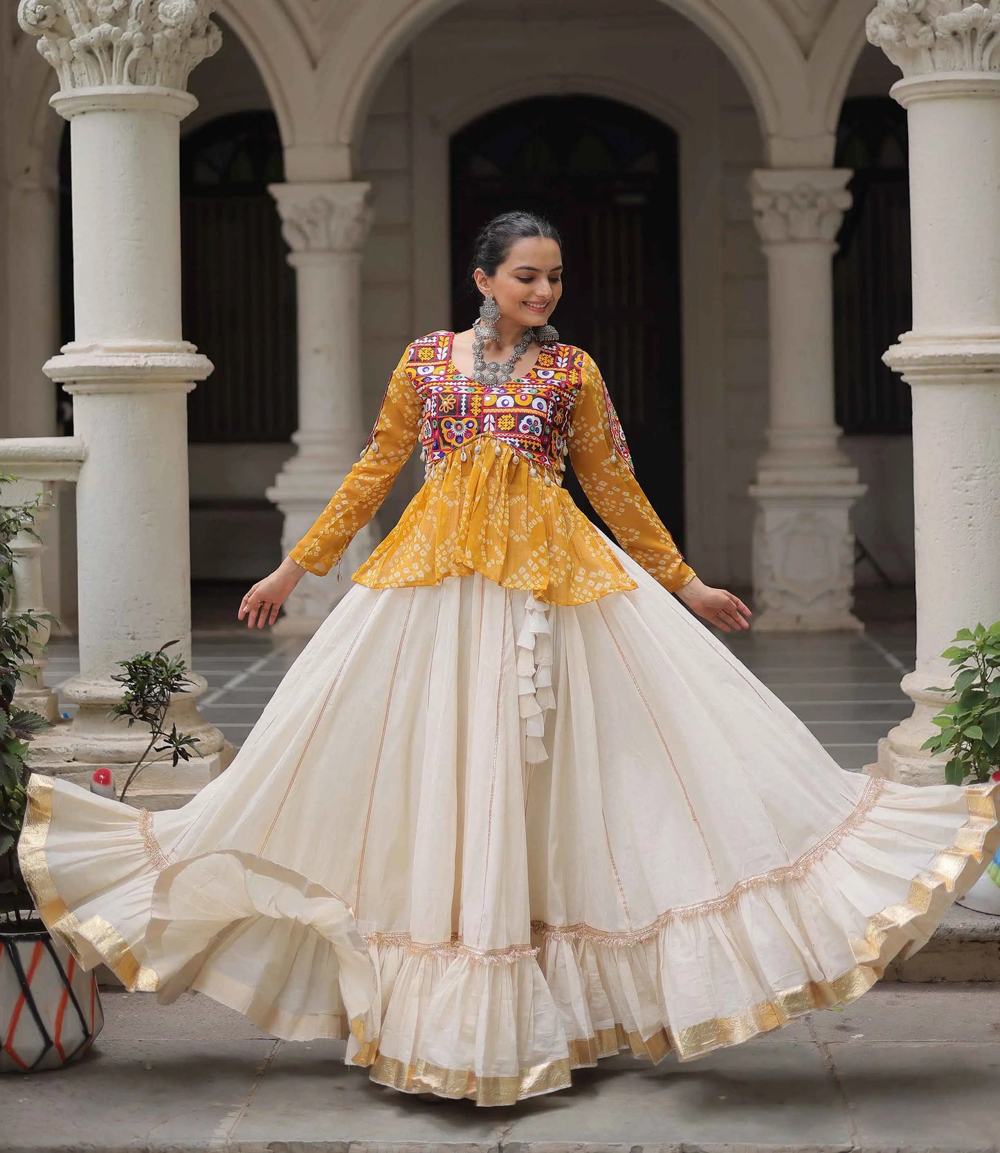 Yellow Bandhani Print Gamthi Work Blouse With Lace Work Navratri Lehenga