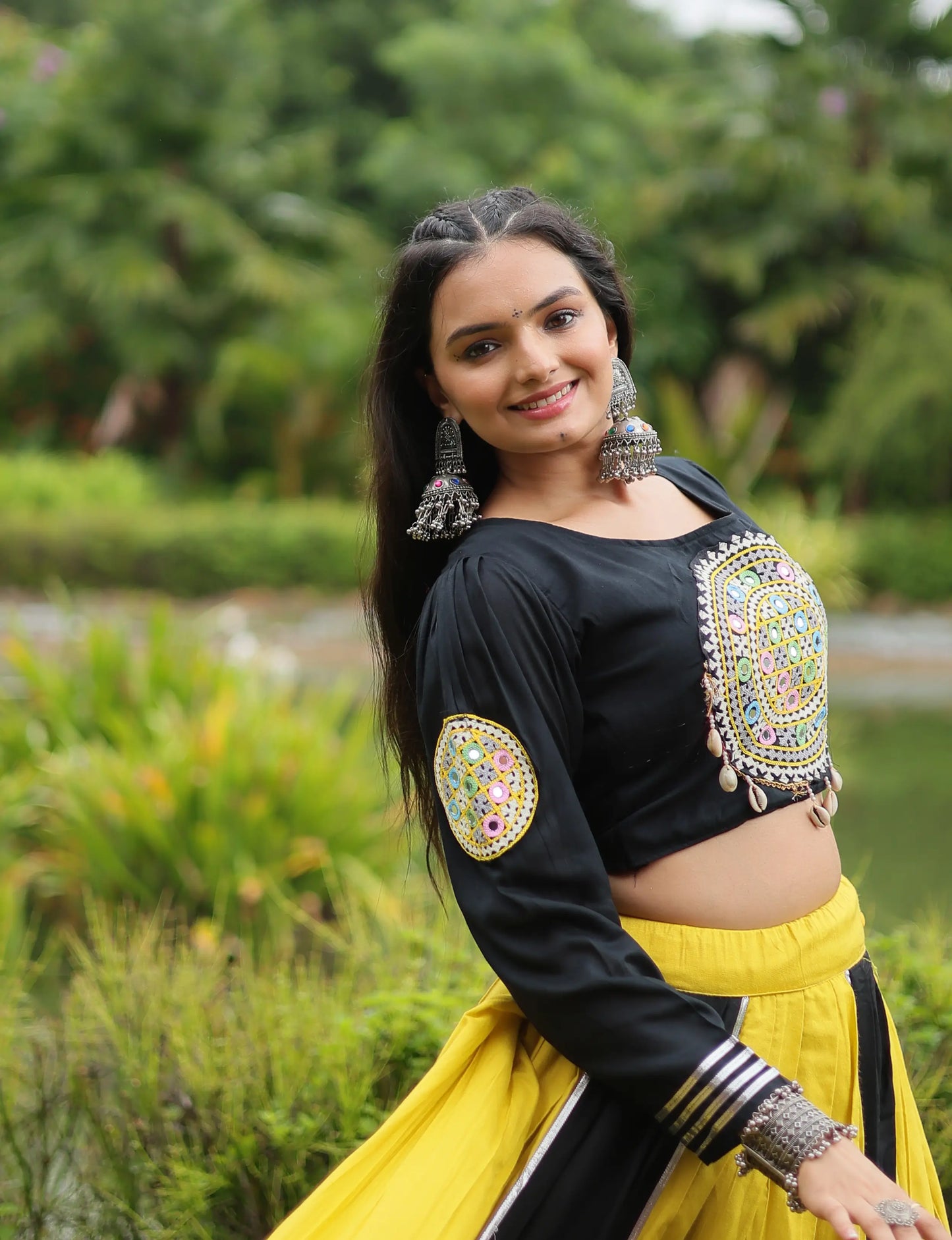 Yellow And Black Navratri Lehenga With Kutchi Gamthi Patch Work