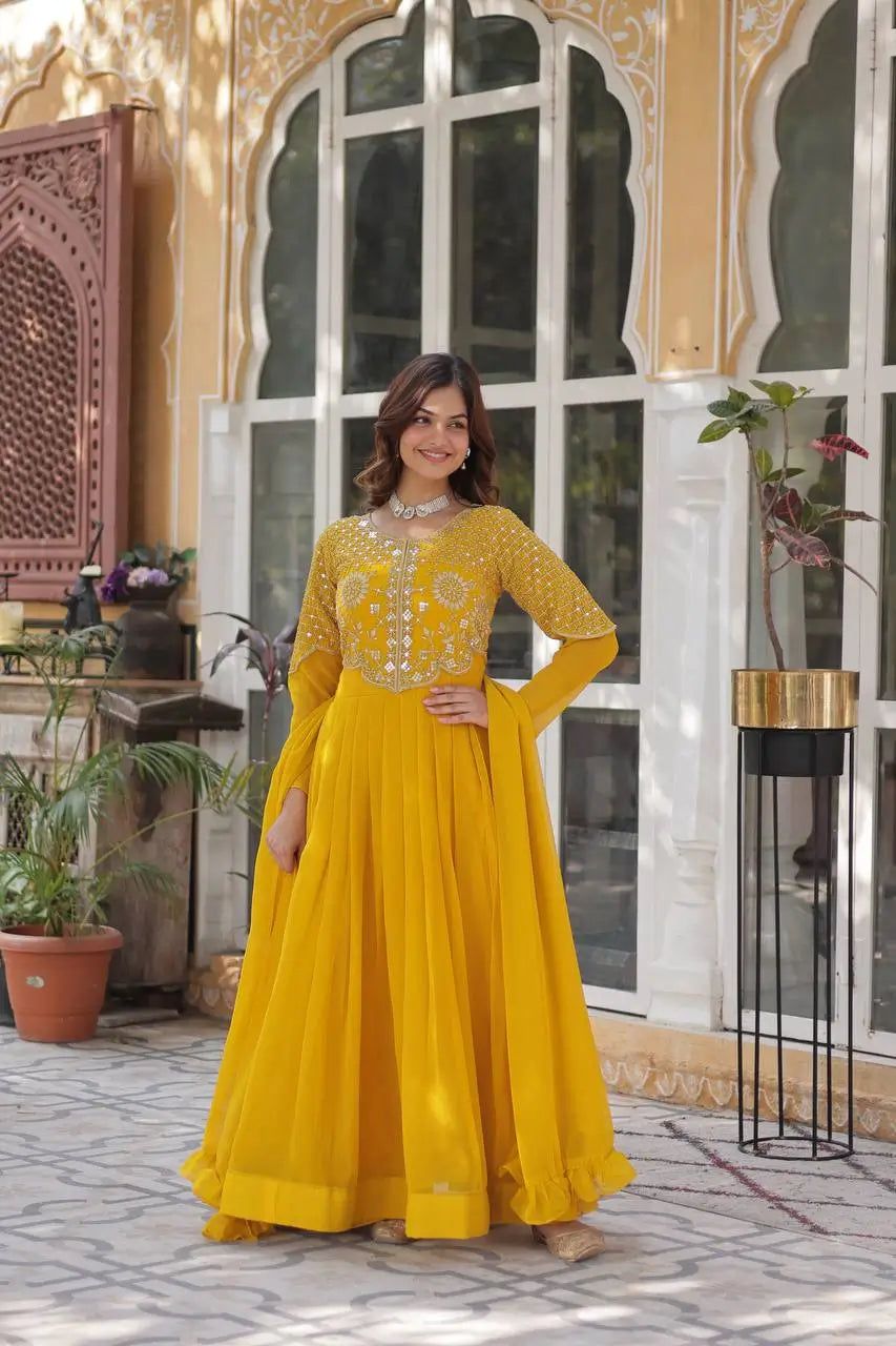 Yellow Ochre Attractive Sequins Embroidery Work Gown And Dupatta