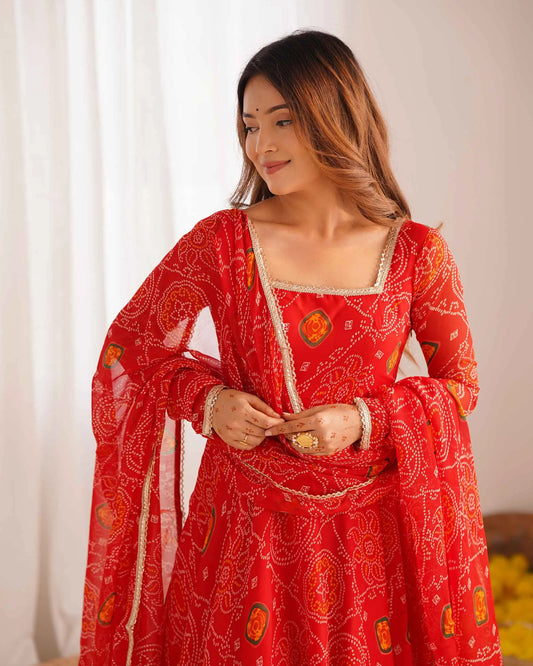 Ruby Red Soft Light Weight Chiffon Bandhej Print Gown With Dupatta