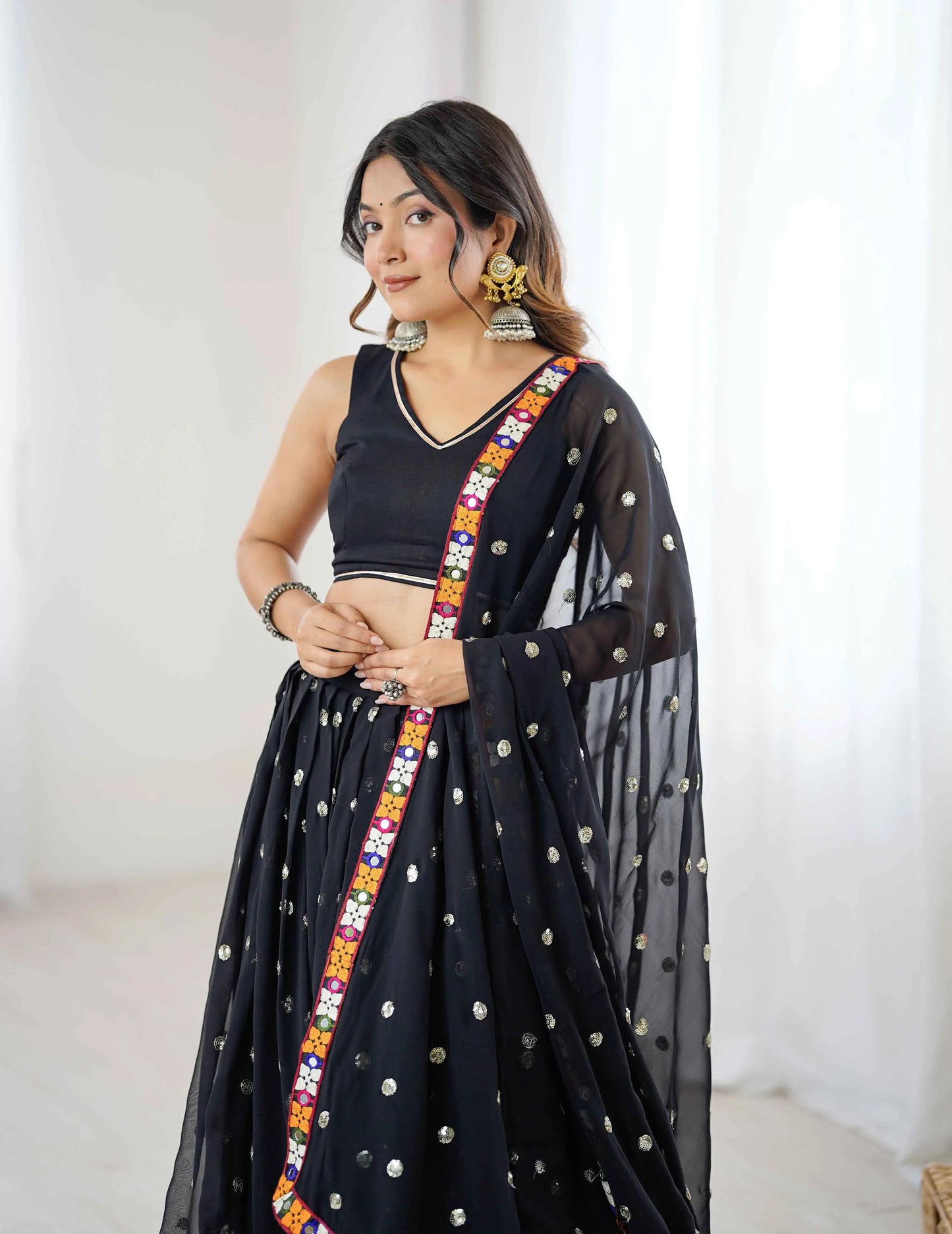 Black Georgette Navratri Lehenga With Sequins Gamthi & Mirror Work
