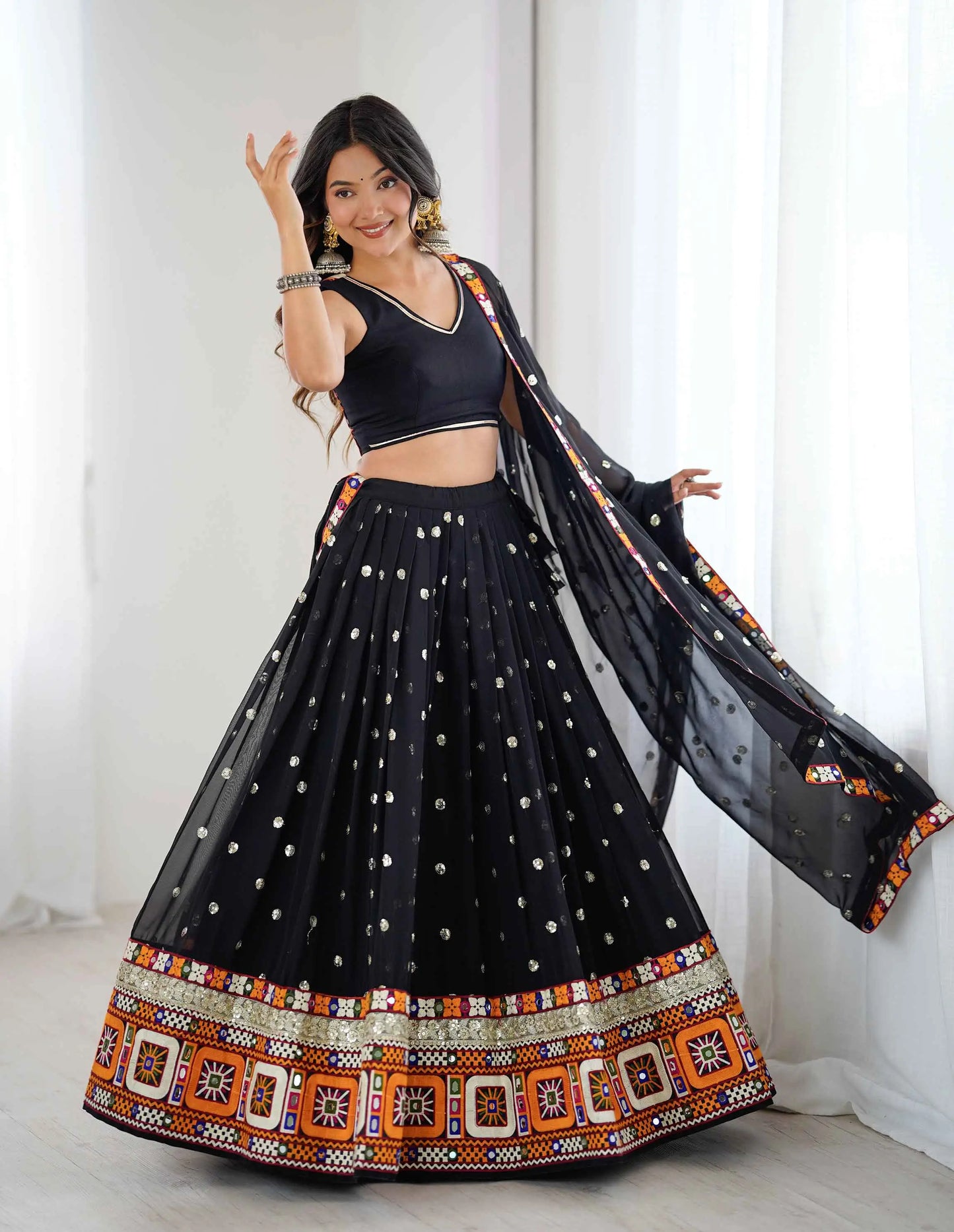 Black Georgette Navratri Lehenga With Sequins Gamthi & Mirror Work