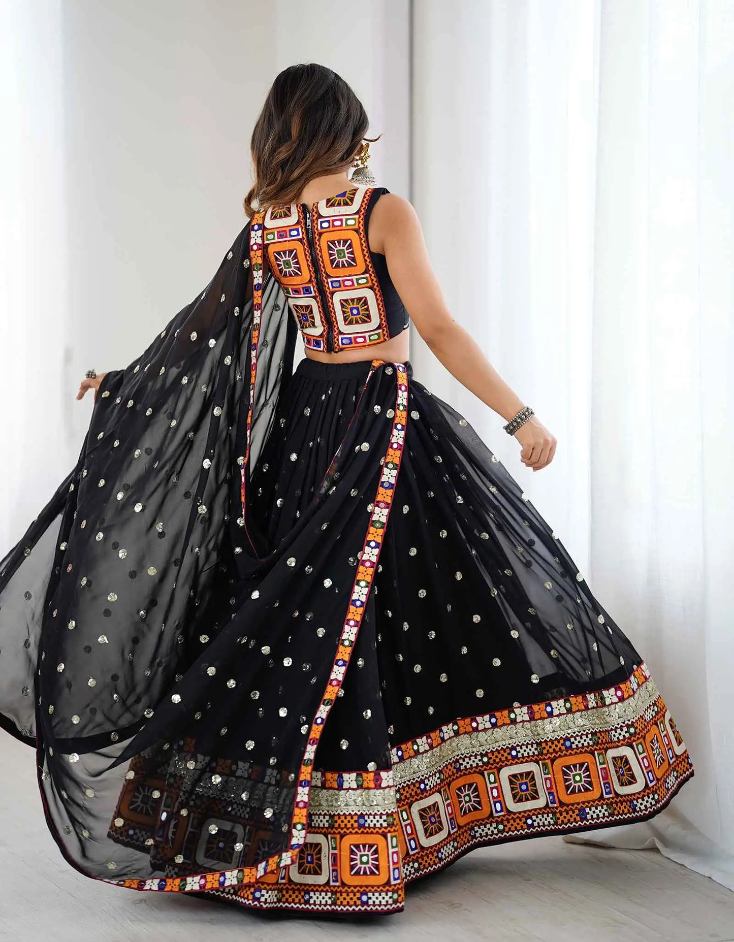 Black Georgette Navratri Lehenga With Sequins Gamthi & Mirror Work